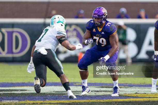 East Carolina Pirates Offensive Lineman Justin Chase blocks East Carolina Pirates Inside Linebacker Chad Stephens during the second half of the...