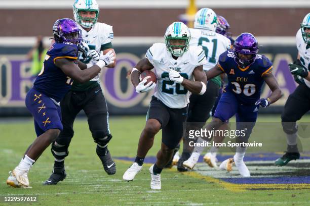 Tulane Green Wave Running Back Cameron Carroll runs with the ball for a touchdown during the second half of the College Football game between the...