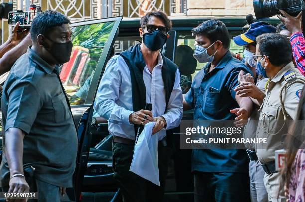 Bollywood actor Arjun Rampal arrives at the Narcotics Control Bureau office after being summoned by the agency for questioning in connection with a...