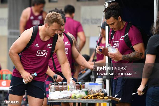 New Zealand's captain Sam Cane takes refreshments after the captain's run training session at the Narrabeen Academy of Sport in Sydney on November 13...