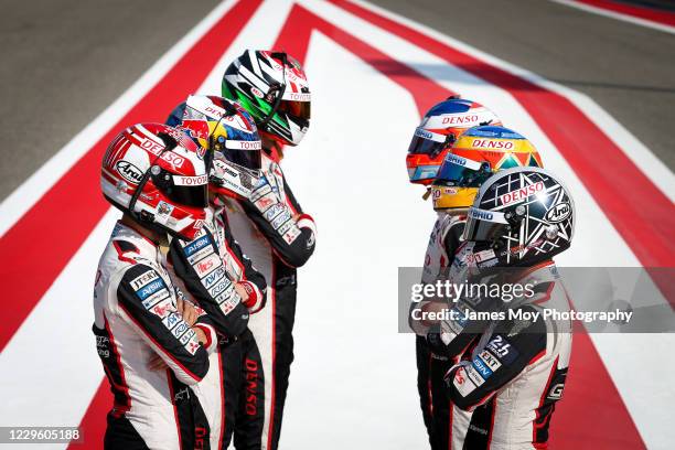 Toyota Gazoo Racing drivers Mike Conway, Kamui Kobayashi, Jose Maria Lopez, Sebastien Buemi, Kazuki Nakajima, and Brendon Hartley line up at the WEC...