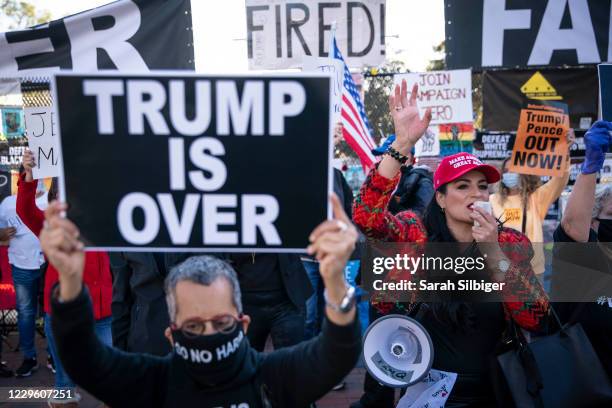 Supporters of U.S. President Donald Trump and counter protesters demonstrate outside of the White House ahead of Saturday's Million MAGA March on...