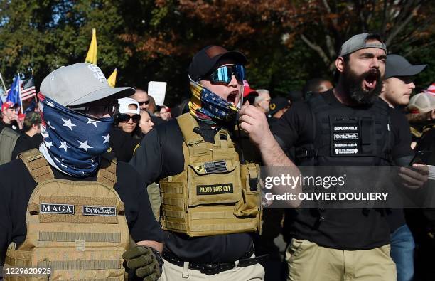 Members of "The Proud Boys" join supporters of US President Donald Trump during a rally in Washington, DC, on November 14, 2020. - Supporters are...
