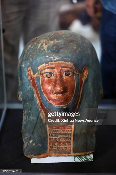 Nov. 14, 2020 -- A newly-discovered artifact is seen on the site of the wooden coffin discovery in Giza province, Egypt, on Nov. 14, 2020. Egyptian...