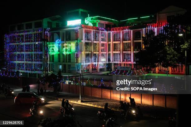 View of the Nepal Electricity Authority Building decorated with lanterns and lights during the Tihar festival, also called Diwali, in Kathmandu....