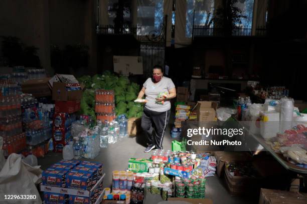 Worker at the Casa de Tabasco Carlos Pellicer located in Mexico City, during the classification of provisions and non-perishable food before the...