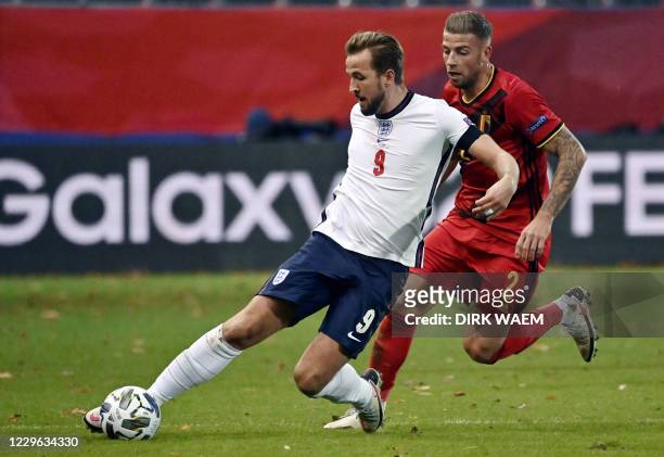England's forward Harry Kane and Belgium's Toby Alderweireld fight for the ball during the UEFA Nations League football match between Belgium and...
