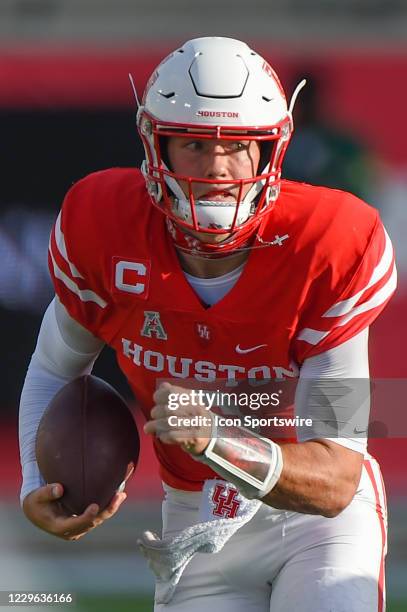 Houston Cougars quarterback Clayton Tune finds running room to the outside during the football game between the University of South Florida Bulls and...