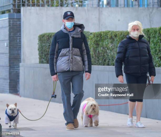 Deborra-lee Furness and Hugh Jackman are seen walking their dogs in SoHo on November 16, 2020 in New York City.