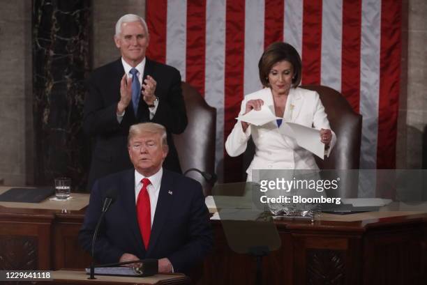 Bloomberg Best of the Year 2020: U.S. House Speaker Nancy Pelosi, a Democrat from California, right, rips up papers after U.S. President Donald...