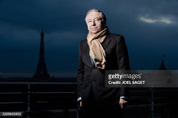 International Automobile Federation President Jean Todt, poses in front of the Eiffel tower in Paris on November 16, 2020.
