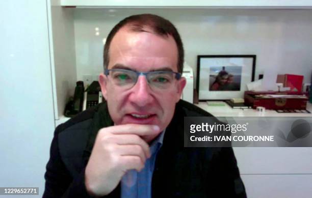 The CEO of Moderna Stéphane Bancel is seen in this video frame grab as he speaks during an interview with AFP on November 17, 2020. - The CEO of...