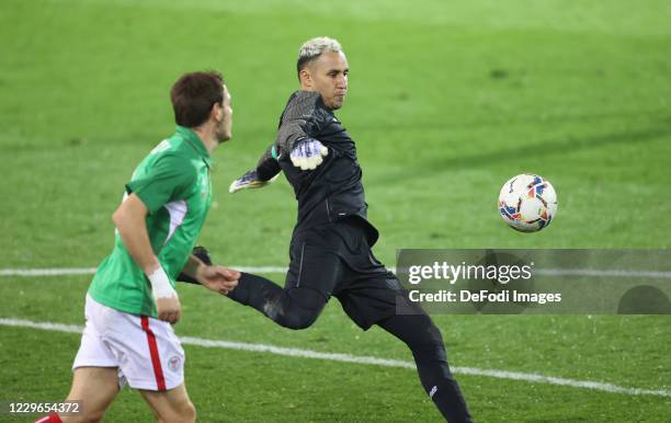 Goalkeeper Keylor Navas of Costa Rica and Jon Bautista of Euskal Selekzioa battle for the ball during the international friendly match between...