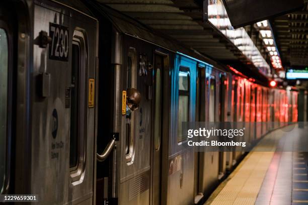 Subway train arrives at a station in New York, U.S., on Tuesday, Nov. 17, 2020. New York's Metropolitan Transportation Authority needs $12 billion of...