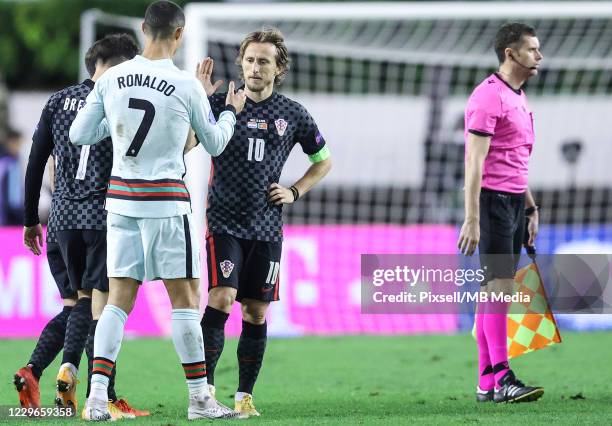 Luka Modric of Croatia and Cristiano Ronaldo of Portugal shake hands after the UEFA Nations League group stage match between Croatia and Portugal at...