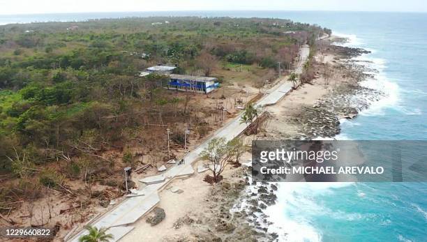 Drone picture of a damaged road left by Hurricane Iota in San Andres, Colombia, on November 17, 2020. - Iota has already left one person dead after...