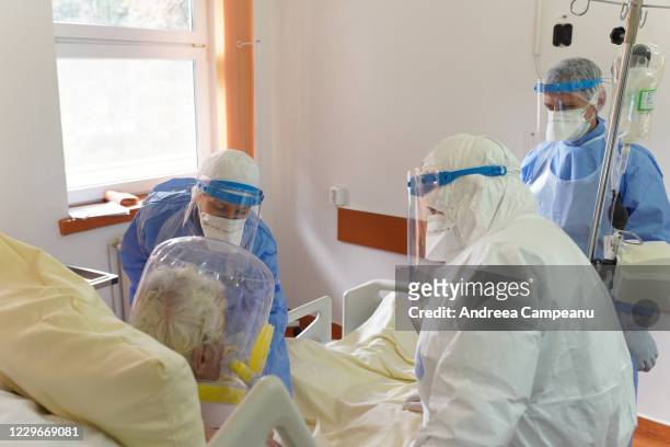 Intensive care medical staff, protected by PPE, are seeing to a patient infected with Covid-19 at the ICU at The Hospital for Infectious Diseases, on...