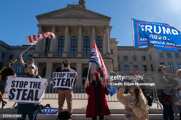 Pro-Trump protesters rally against the results of the U.S. Presidential election outside the Georgia State Capitol on November 18, 2020 in Atlanta,...