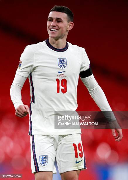Englands's midfielder Phil Foden celebrates scoring his teams third goal during the UEFA Nations League group A2 football match between England and...
