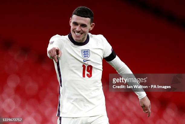 England's Phil Foden celebrates scoring his side's third goal of the game during the UEFA Nations League Group A2 match at Wembley Stadium, London.