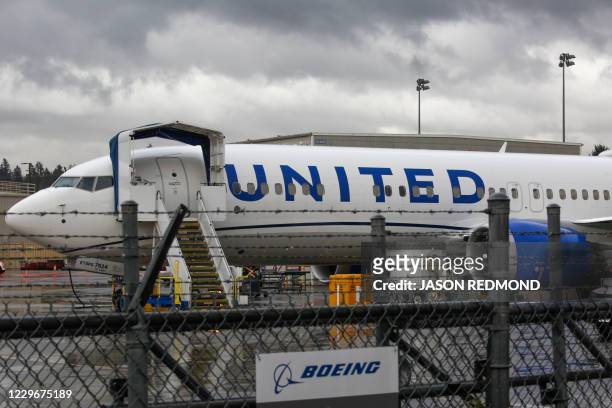 Boeing 737 MAX airliner with United Airlines markings is pictured at the Boeing Factory in Renton, Washington on November 18, 2020. - US regulators...