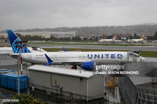 Boeing 737 MAX airliner with United Airlines markings is pictured on the ramp at Renton Airport adjacent to the Boeing Factory in Renton, Washington...