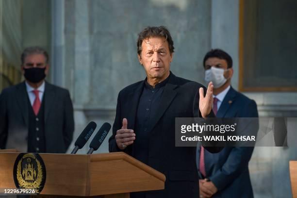 Pakistan's Prime Minister Imran Khan speaks during a joint press conference with Afghan president at the Presidential Palace in Kabul on November 19,...