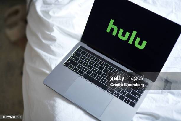 The Hulu logo on a laptop computer arranged in New York, U.S., on Wednesday, Nov. 18, 2020. Walt Disney Co.'s Hulu division is lifting the...