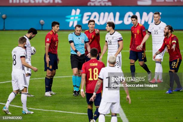 Toni Kroos of Germany, Ilkay Gundogan of Germany, Rodri of Spain, referee Andreas Ekberg, Pau Torres of Spain, Ferran Torres of Spain, Leon Goretzka...