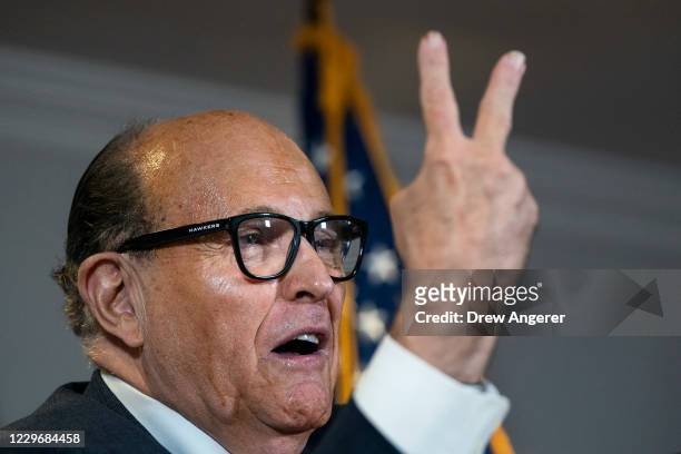 Rudy Giuliani accuses people of voting twice as he speaks to the press about various lawsuits related to the 2020 election, inside the Republican...