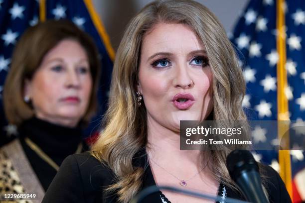 Jenna Ellis, right, and Sydney Powell, attorneys for President Donald Trump, conduct a news conference at the Republican National Committee on...