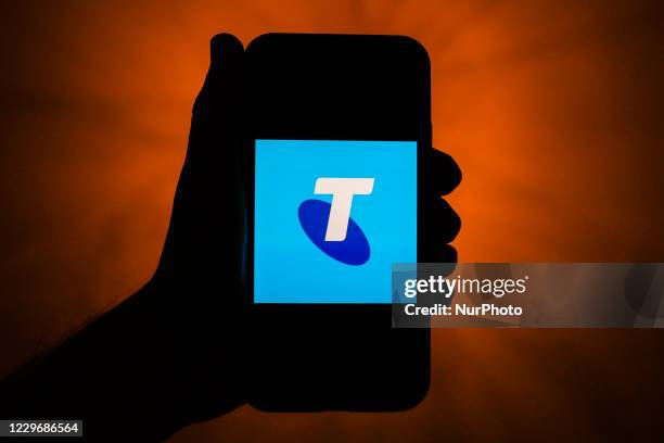 Telstra logo is seen displayed on a phone screen in this illustration photo taken in Poland on November 19, 2020.