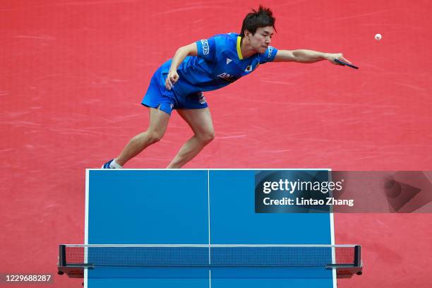 Koki Niwa of Japan competes against Lin Gaoyuan of China in the men's Singles - Round of 16 during day two of 2020 ITTF Finals at Zhengzhou Olympic...