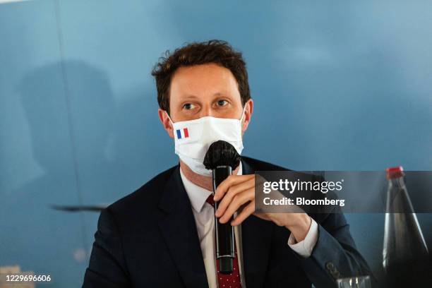 Clement Beaune, Frances European Union affairs minister, wears a protective face mask during a news conference as the Port of Le Havre presents its...