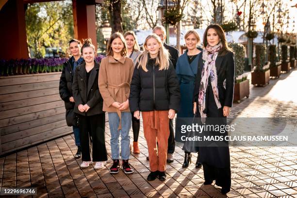 Crownprincess Mary of Denmark poses with Thea, Wilma and Esther and secretary general of Unicef in Denmark Karen Haekkerup, chairman of the board in...