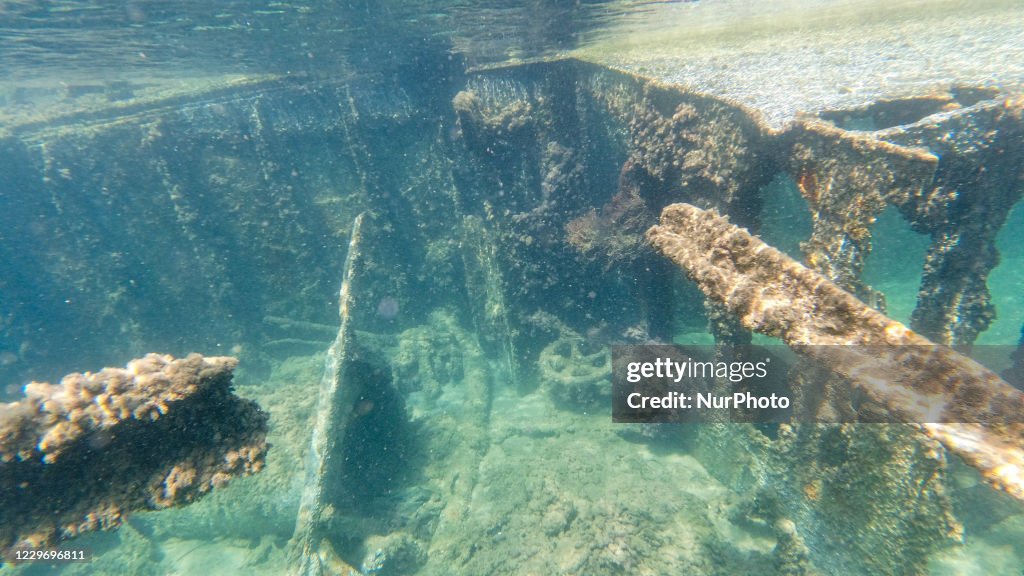 Underwater Images Of A Shipwreck In Greece