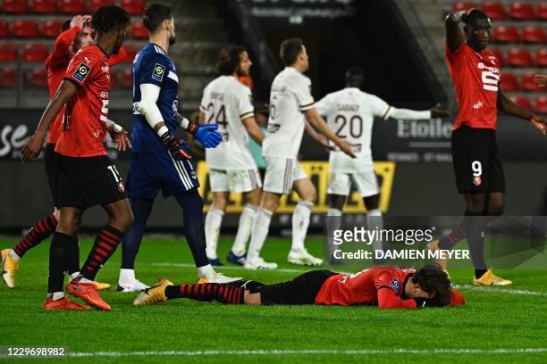 Rennes' French forward Adrien Hunou reacts on the ground after missing a goal during the French L1 football match between Stade Rennais and Bordeaux,...