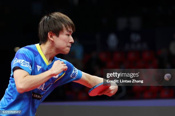 Koki Niwa of Japan competes against Lin Gaoyuan of China in the men's Singles - Round of 16 during day two of 2020 ITTF Finals at Zhengzhou Olympic...