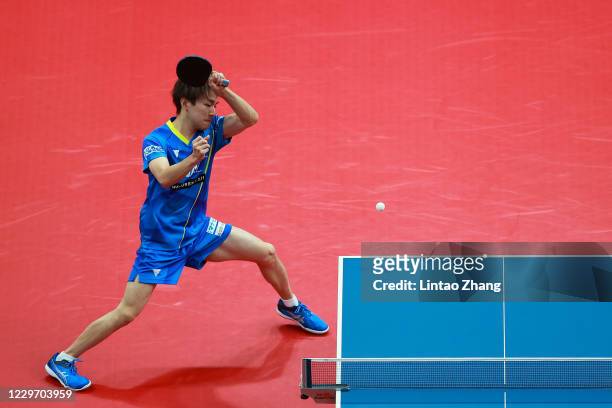 Koki Niwa of Japan competes against Lin Gaoyuan of China in the men's Singles - Round of 16 during day two of 2020 ITTF Finals at Zhengzhou Olympic...