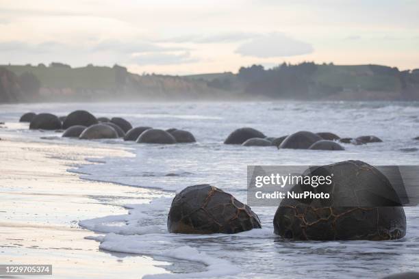 Moeraki Boulders are seen at Koekohe Beach in Moeraki, New Zealand on November 21, 2020. According to scientists, the Moeraki Boulders formation...