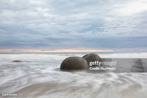 Moeraki Boulders are seen at Koekohe Beach in Moeraki, New Zealand on November 21, 2020. According to scientists, the Moeraki Boulders formation...