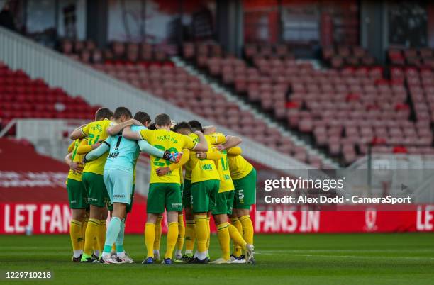 Norwich City players huddle before kick off during the Sky Bet Championship match between Middlesbrough and Norwich City at Riverside Stadium on...