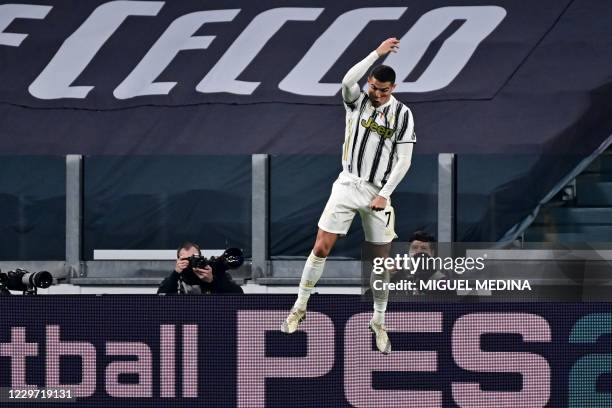 Juventus' Portuguese forward Cristiano Ronaldo celebrates after scoring his second goal during the Italian Serie A football match Juventus vs...