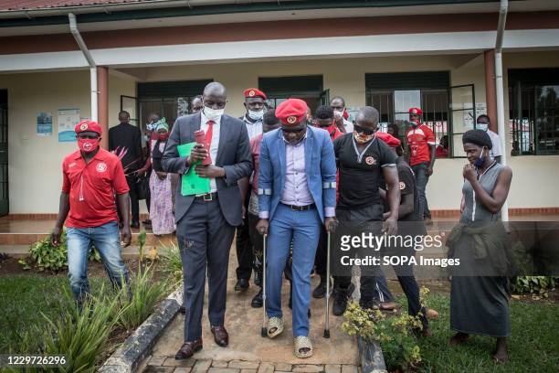Politician Francis Zaake leaves Mityana court, where he is challenging his arrest on charges of "attempted murder", for trying to distribute food to...