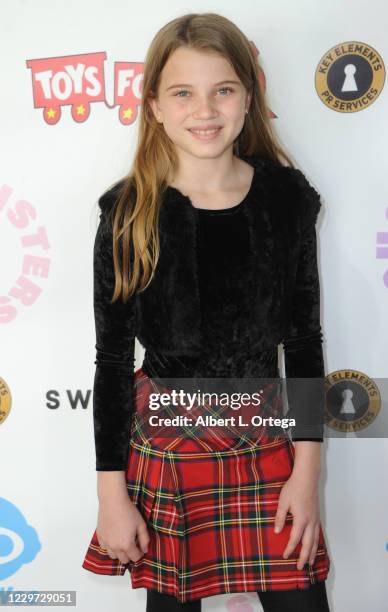 Caitlin Reagan participates in the 2nd Annual Toys For Tots Toy Drive held at The Industry Loft Space on November 21, 2020 in Hollywood, California.