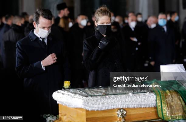 Prince Philip Of Serbia and Danica Marinkovic pay their last respects to the late Serbian Patriarch Irinej during his funeral service at Belgrade's...