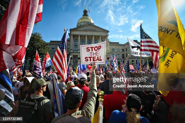 Hundreds of Trump supporters and gather near the Capitol Building for the Stop the Steal Rally in Atlanta, GA. As well as counter protesters in...