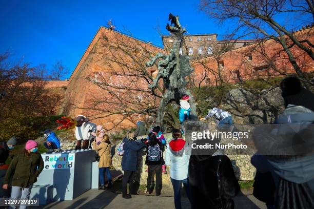 Fire-breathing sheep made of LEGO bricks appeared next to the dragons statue near Wawel Castle. Krakow, Poland on November 21, 2020. The installation...