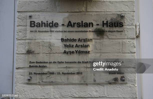 Sign on a house, which was burned by arson in a Neo-Nazi attack in 1992, is seen within commemorations marking the 28th anniversary of racist arson...