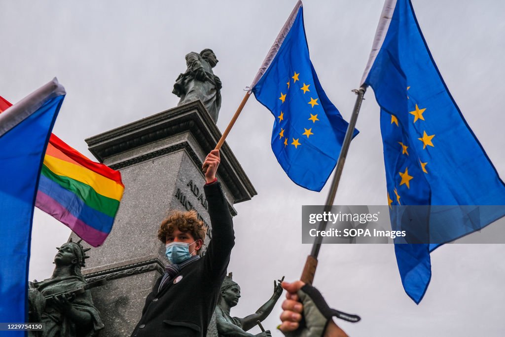 A protester holding the European Union flag during the...